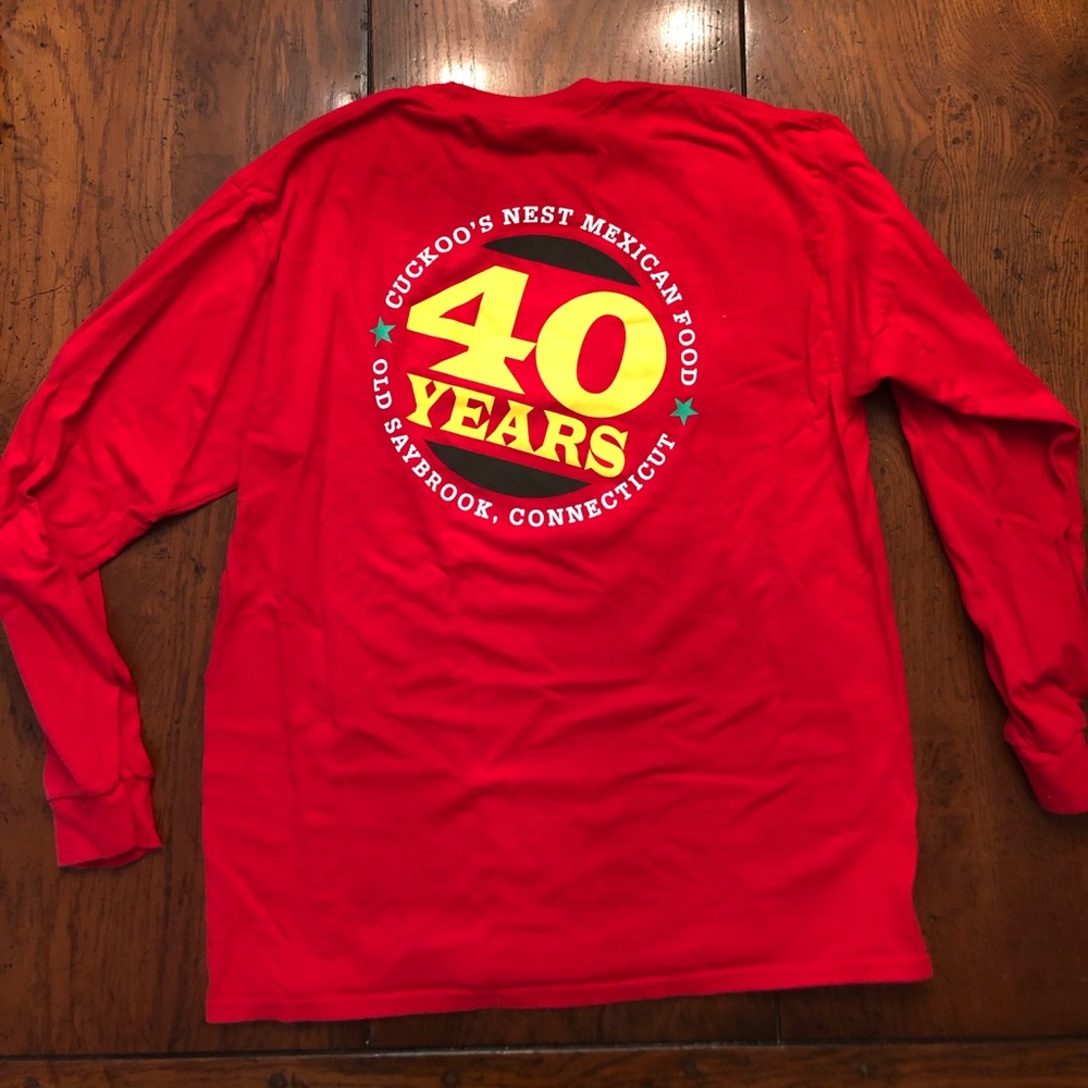 Mens large long sleeve t-shirt. New never worn. Local famous restaurant.